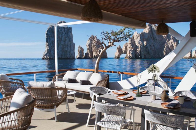 The Deck, a 49 foot special event catamaran lounge overlooking Lands End in Cabo